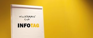 Bild: Flipchart mit Beschriftung herzlich willkommen zum Infotag
